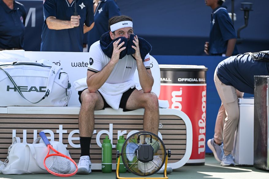 Taylor Fritz of the United States rests during his match with Alex Michelsen of the United States at the DC Open tennis tournament in Washington, D.C., Friday, July 31, 2026. (All-Pro Reels)