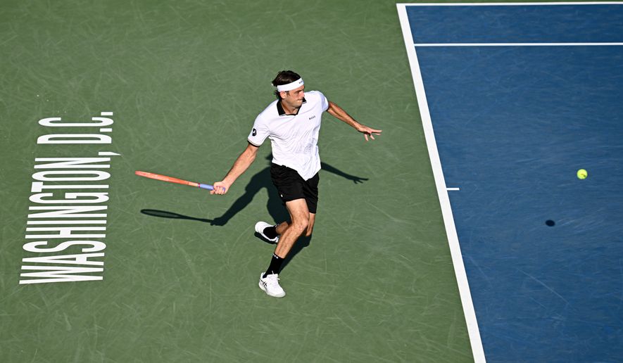 Taylor Fritz of the United States returns a shot to Alex Michelsen of the United States in a match at the DC Open tennis tournament in Washington, D.C., Friday, July 31, 2026. (All-Pro Reels)