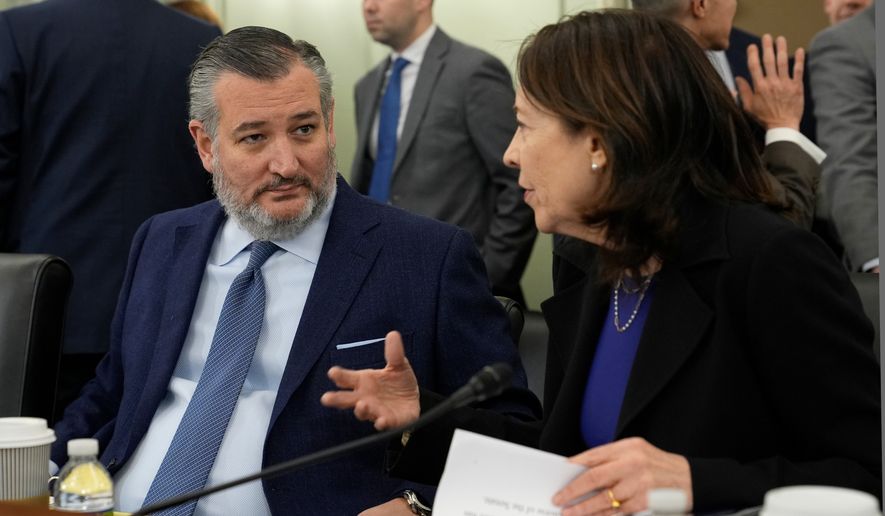 Senate Commerce, Science, and Transportation Committee Chair Sen. Ted Cruz, R-Texas, left, talks with ranking member Sen. Maria Cantwell, D-Wash., right, before the start a hearing on Capitol Hill in Washington, Wednesday, Jan. 15, 2025. (AP Photo/Susan Walsh,File)