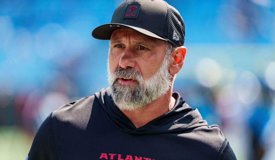 FILE - Atlanta Falcons defensive coordinator Jeff Ulbrich looks on before an NFL football game between the Carolina Panthers and the Atlanta Falcons, Sep. 21, 2025, in Charlotte, N.C. (AP Photo/Jacob Kupferman, File)