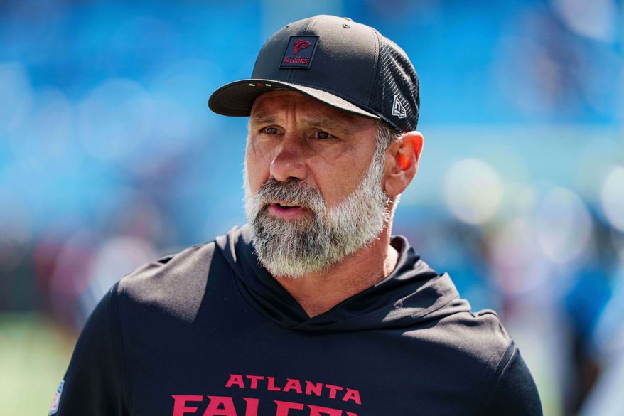FILE - Atlanta Falcons defensive coordinator Jeff Ulbrich looks on before an NFL football game between the Carolina Panthers and the Atlanta Falcons, Sep. 21, 2025, in Charlotte, N.C. (AP Photo/Jacob Kupferman, File)
