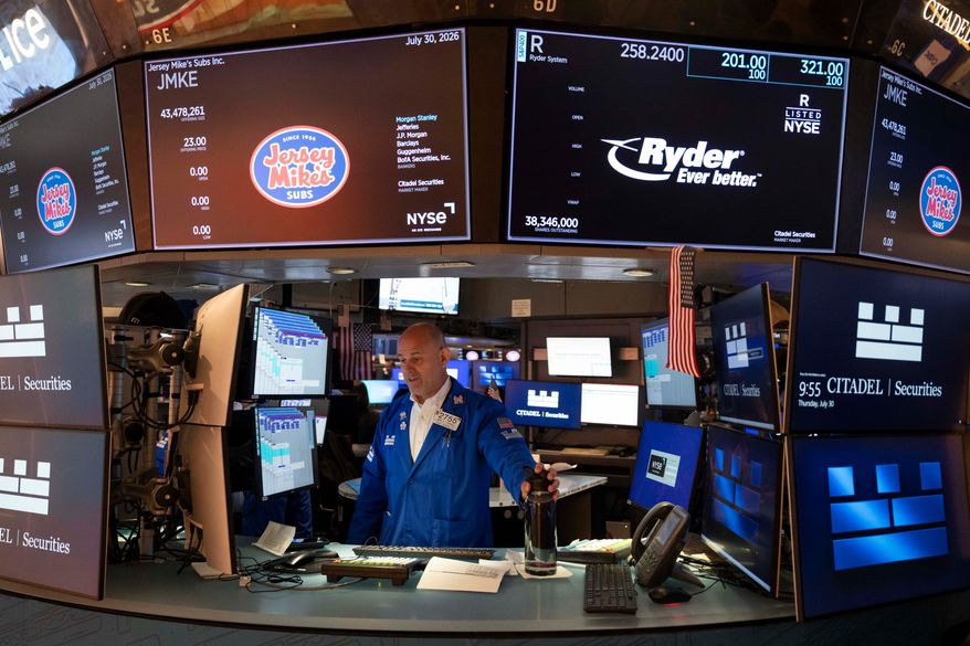 Specialist Mark Fitzgerald works on the floor of the New York Stock Exchange, Thursday, July 30, 2026, in New York. (AP Photo/Yuki Iwamura)