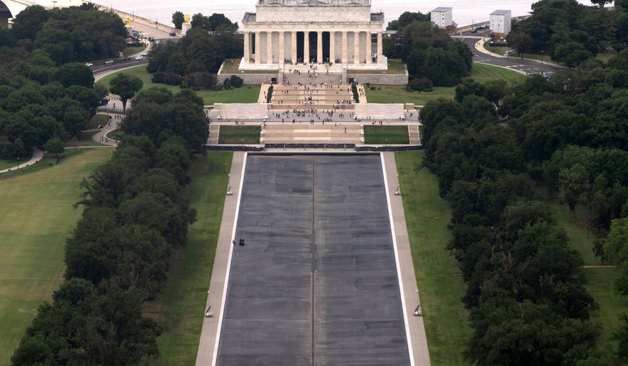 The Lincoln Memorial Reflecting Pool is seen from the Washington Monument, Friday, July 31, 2026, in Washington. (AP Photo/Mark Schiefelbein)