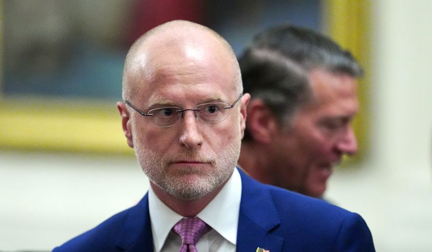 Federal Communications Commission Chairman Brendan Carr departs an event in the East Room of the White House, March 20, 2026, in Washington. (AP Photo/Julia Demaree Nikhinson, File)