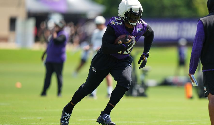 Baltimore Ravens running back Derrick Henry (22) works out during practice at the team's NFL football training camp, Wednesday, July 29, 2026, at the Under Armour Performance Center in Owings Mills, Md. (AP Photo/Stephanie Scarbrough)