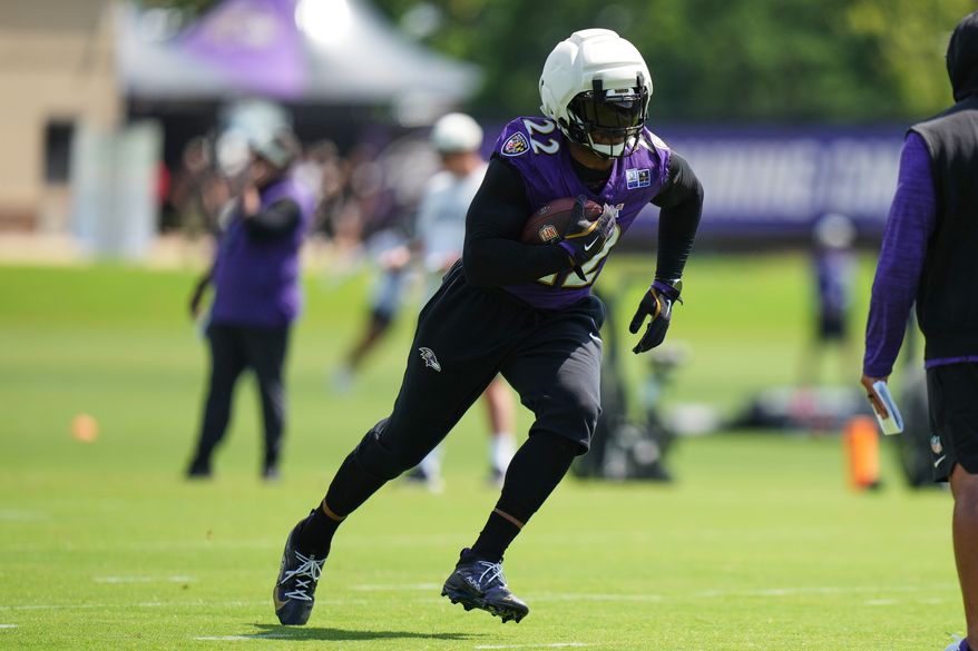 Baltimore Ravens running back Derrick Henry (22) works out during practice at the team's NFL football training camp, Wednesday, July 29, 2026, at the Under Armour Performance Center in Owings Mills, Md. (AP Photo/Stephanie Scarbrough)