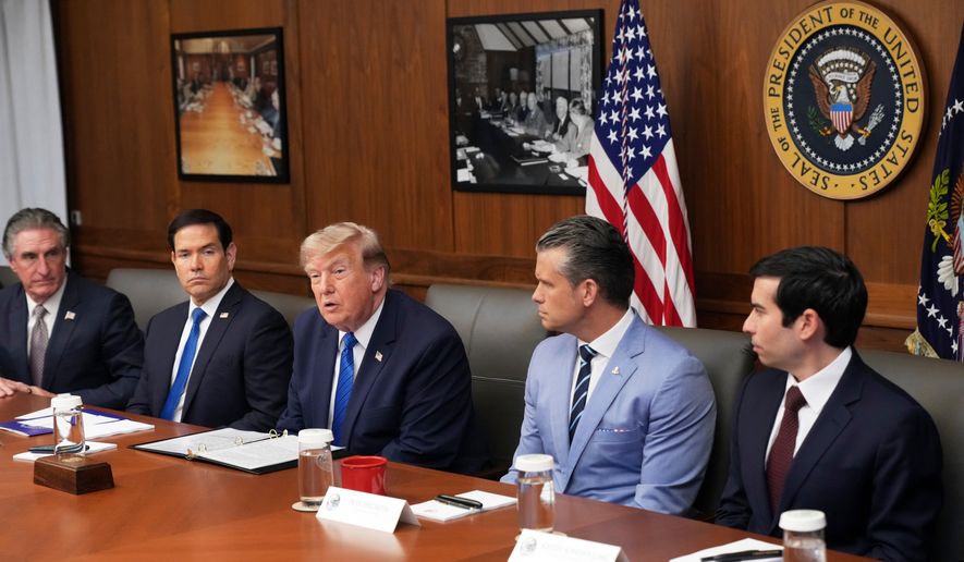 President Donald Trump, seated center, joined by Interior Secretary Doug Burgum, from left, Secretary of State Marco Rubio, Defense Secretary Pete Hegseth, and acting Labor Secretary Keith Sonderling, attends a Cabinet meeting, Friday, July 31, 2026, at Camp David, the presidential retreat, near Thurmont, Md., Friday, July 31, 2026. (AP Photo/Jacquelyn Martin)