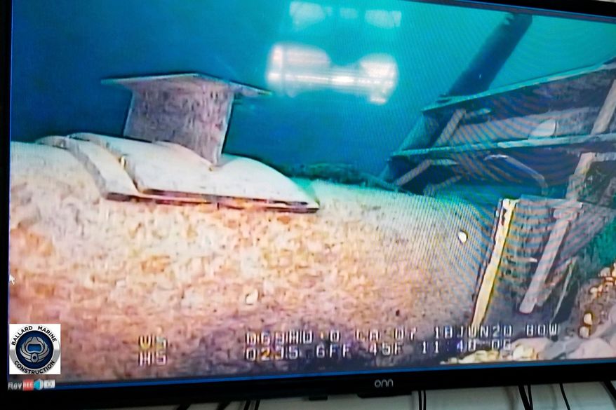 This photo provided by the Michigan Department of Environment, Great Lakes, and Energy in June 2020 shows damage to anchor support EP-17-1 on the east leg of the Enbridge Line 5 pipeline in the Straits of Mackinac in Michigan, displayed on a television screen. (Michigan Department of Environment, Great Lakes, and Energy via AP, File)