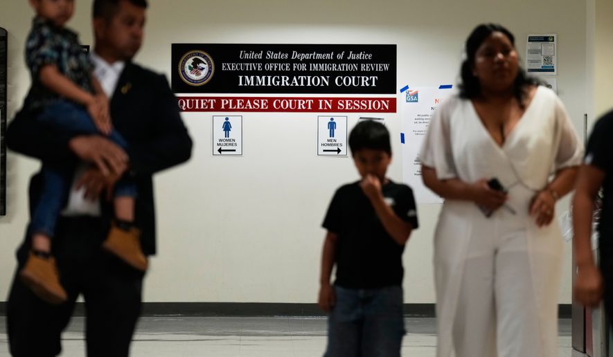 People arrive for immigration court hearings in New York, Monday, July 27, 2026. (AP Photo/Seth Wenig)