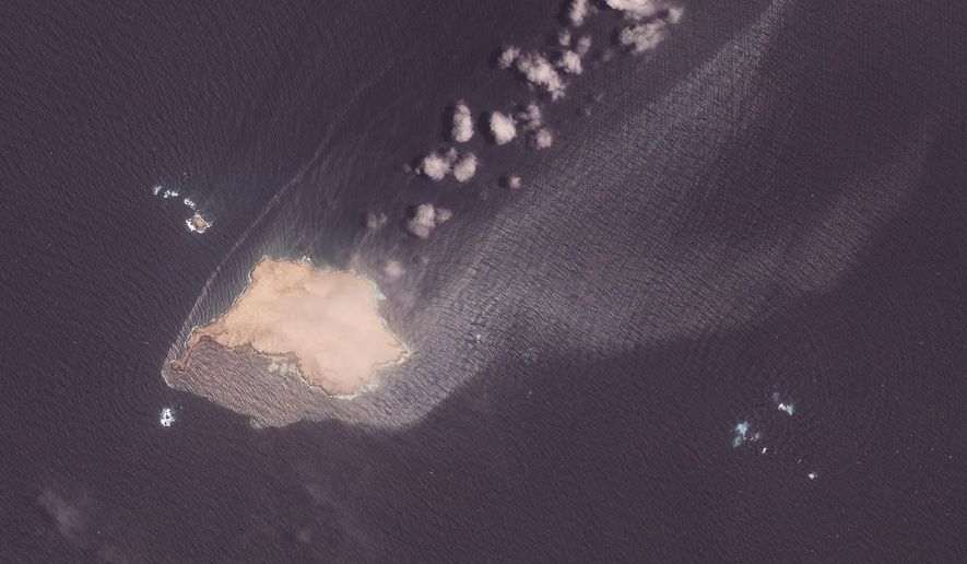 This satellite image from Planet Labs PBC shows crude oil leaking and spreading from the sanctioned Suezmax tanker Caroline Bezengi grounded at Qibliyah Island, off the coast of Oman, on Friday, July 31, 2026. (Planet Labs PBC via AP)
