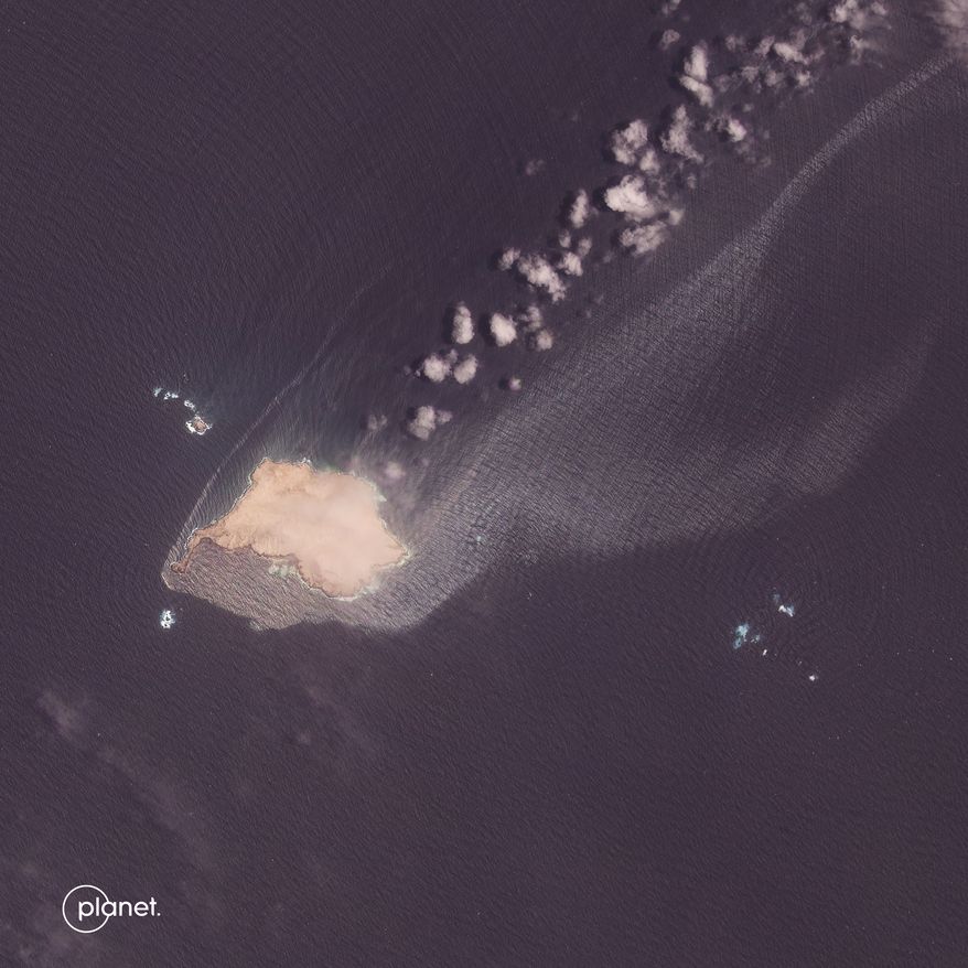 This satellite image from Planet Labs PBC shows crude oil leaking and spreading from the sanctioned Suezmax tanker Caroline Bezengi grounded at Qibliyah Island, off the coast of Oman, on Friday, July 31, 2026. (Planet Labs PBC via AP)