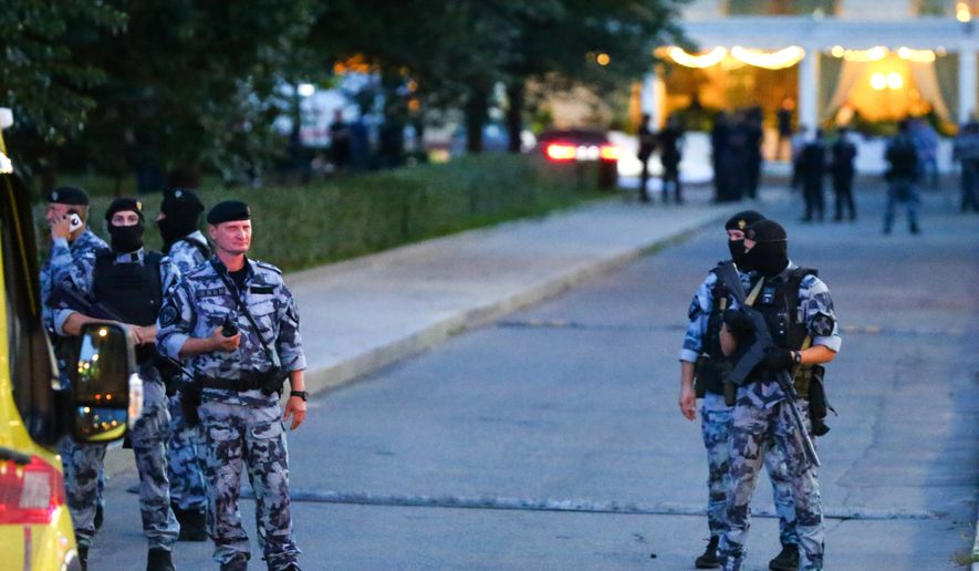 Police block an area near a deadly explosion at a restaurant in Moscow, Saturday, Aug. 1, 2026. (Sergei Vedyashkin/Moscow News Agency via AP)
