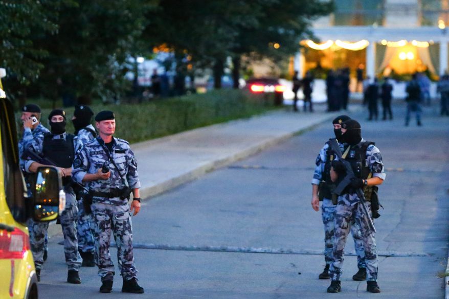 Police block an area near a deadly explosion at a restaurant in Moscow, Saturday, Aug. 1, 2026. (Sergei Vedyashkin/Moscow News Agency via AP)
