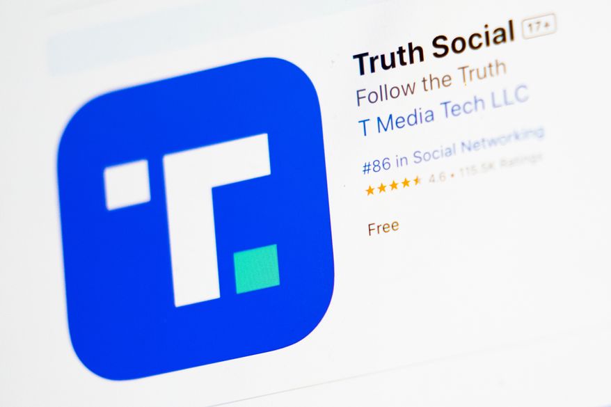 The download screen for the Truth Social app is displayed on a laptop computer, March 20, 2024, in New York. (AP Photo/John Minchillo, File)