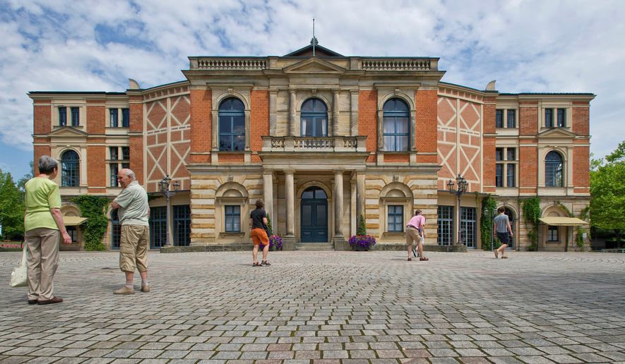 FILE - Visitors walk the grounds of the festival opera house "Festspielhaus" in Bayreuth, southern Germany, on July 17, 2010. (Eckehard Schulz/DAPD via AP)
