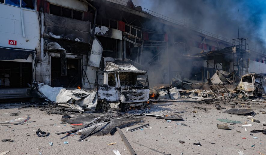 A Nova Poshta postal warehouse is destroyed following Russian air attack on the outskirts of Kharkiv, Ukraine, Sunday, Aug. 2, 2026. (AP Photo/Yevhen Titov)