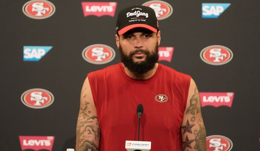 San Francisco 49ers' Mike Evans speaks at a news conference during the NFL football team's training camp Friday, July 31, 2026, in Santa Clara, Calif. (AP Photo/Jeff Chiu)