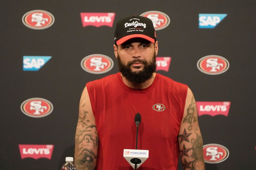 San Francisco 49ers' Mike Evans speaks at a news conference during the NFL football team's training camp Friday, July 31, 2026, in Santa Clara, Calif. (AP Photo/Jeff Chiu)