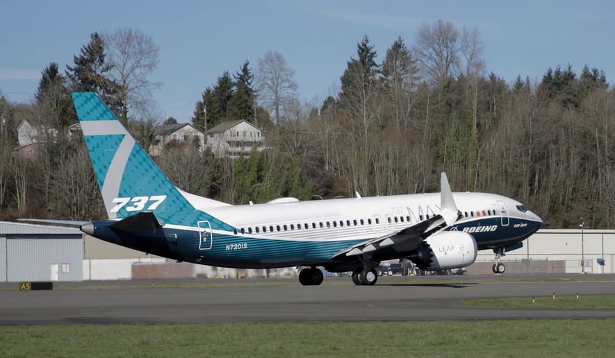 FILE - A Boeing 737 MAX 7 takes off on its first flight on March 16, 2018, in Renton, Wash. (AP Photo/Jason Redmond, File)