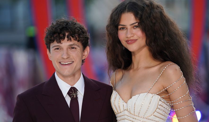 Tom Holland and Zendaya pose for photographers upon arrival at the Spider-Man: Brand New Day premiere in London, England, Wednesday, July 29, 2026. (Photo by Alberto Pezzali/Invision/AP)