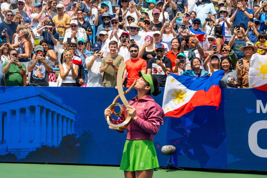 Alex Eala of the Philippines celebrates after beating Jessica Pegula of the United States in the WTA singles final of the DC Open tennis tournament in Washington, D.C., Monday, August 3, 2026. (All-Pro Reels)