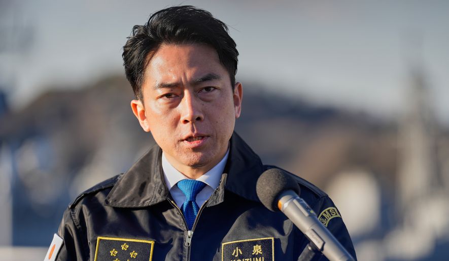 Japan's Defense Minister Shinjiro Koizumi speaks with media after meeting with South Korea's Defense Minister Ahn Gyu-back at the headquarters of the Japan Maritime Self-Defense Force Yokosuka District, south of Tokyo, on Friday, Jan. 30, 2026. (AP Photo/Eugene Hoshiko, File)