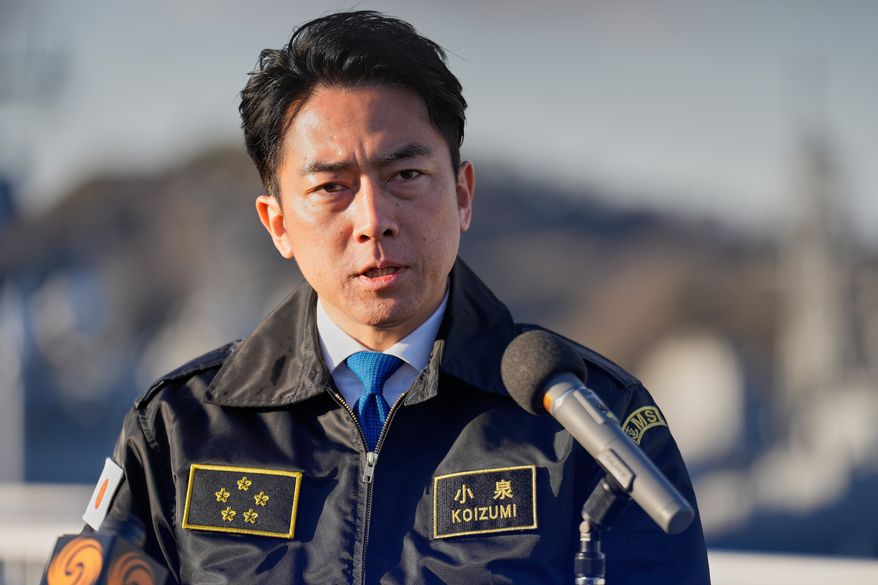 Japan's Defense Minister Shinjiro Koizumi speaks with media after meeting with South Korea's Defense Minister Ahn Gyu-back at the headquarters of the Japan Maritime Self-Defense Force Yokosuka District, south of Tokyo, on Friday, Jan. 30, 2026. (AP Photo/Eugene Hoshiko, File)