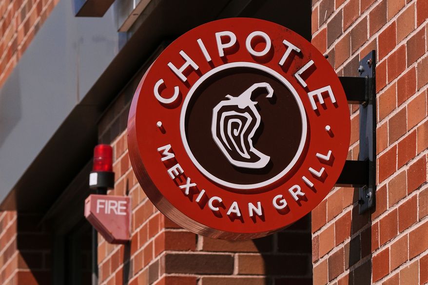 The Chipotle logo is displayed at a store, Aug. 13, 2025, in Newton, Mass. (AP Photo/Charles Krupa, File)