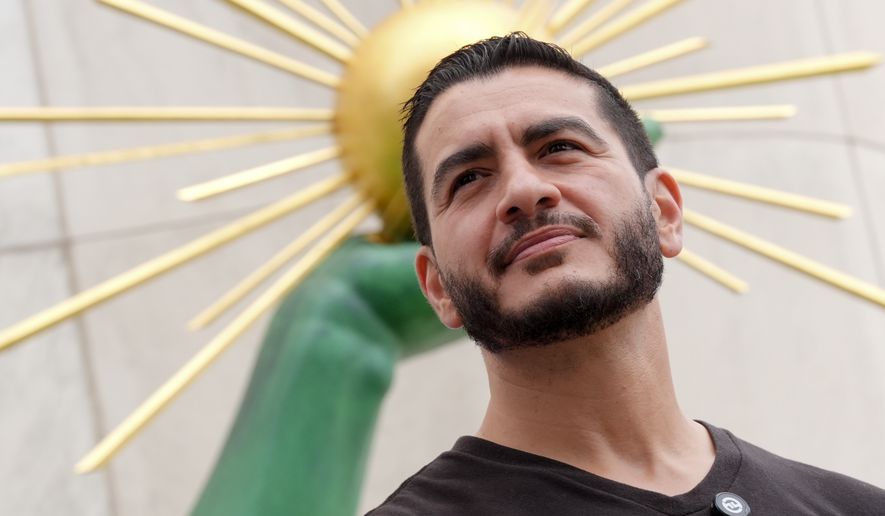 Abdul El-Sayed, a progressive candidate in the Democratic primary for U.S. Senate in Michigan, attends a news conference at the Spirit of Detroit following the March of the Many, Sunday, Aug. 2, 2026, in Detroit. (AP Photo/Julia Demaree Nikhinson)
