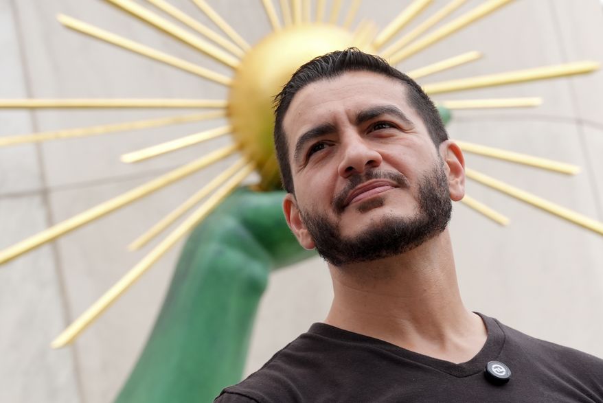 Abdul El-Sayed, a progressive candidate in the Democratic primary for U.S. Senate in Michigan, attends a news conference at the Spirit of Detroit following the March of the Many, Sunday, Aug. 2, 2026, in Detroit. (AP Photo/Julia Demaree Nikhinson)