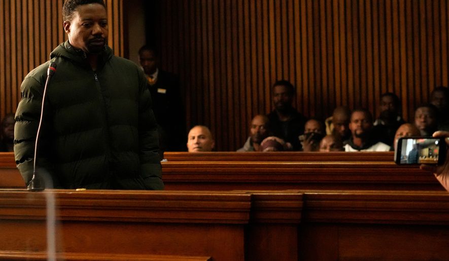Ndodana Mkhanyisi Tshuma, a British citizen of Zimbabwean origin, appears in a court in Johannesburg, South Africa, Monday, July 13, 2026. (AP Photo/Themba Hadebe)