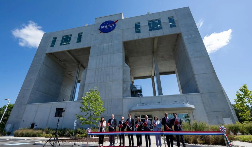 From left to right: Casey Swails, NASA deputy associate administrator; Mike Waller, vice president of BL Harbert International Federal Division; Edward C. Forst, administrator of the U.S. General Services Administration; NASA Administrator Jared Isaacman; Dr. Trina Dyal, director of NASA’s Langley Research Center; Rep. Robert “Bobby” Scott (D-Va.); Virginia Lt. Gov. Ghazala F. Hashmi; Jimmy Gray, mayor, City of Hampton; and Amit Kshatriya, NASA associate administrator, pose for a photo before cutting the ribbon to open the Flight Dynamics Research Facility, NASA’s newest wind tunnel, Friday, July 31, 2026, at NASA’s Langley Research Center in Hampton, Virginia. (Credit: NASA/Keegan Barber)
