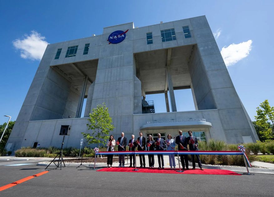From left to right: Casey Swails, NASA deputy associate administrator; Mike Waller, vice president of BL Harbert International Federal Division; Edward C. Forst, administrator of the U.S. General Services Administration; NASA Administrator Jared Isaacman; Dr. Trina Dyal, director of NASA’s Langley Research Center; Rep. Robert “Bobby” Scott (D-Va.); Virginia Lt. Gov. Ghazala F. Hashmi; Jimmy Gray, mayor, City of Hampton; and Amit Kshatriya, NASA associate administrator, pose for a photo before cutting the ribbon to open the Flight Dynamics Research Facility, NASA’s newest wind tunnel, Friday, July 31, 2026, at NASA’s Langley Research Center in Hampton, Virginia. (Credit: NASA/Keegan Barber)