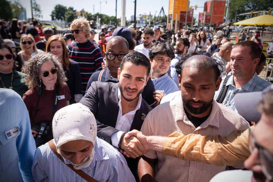 Abdul El-Sayed departs following a news conference at the Spirit of Detroit shortly after winning the Democratic nomination for U.S. Senate in Michigan, Wednesday, Aug. 5, 2026, in Detroit. (AP Photo/Julia Demaree Nikhinson)