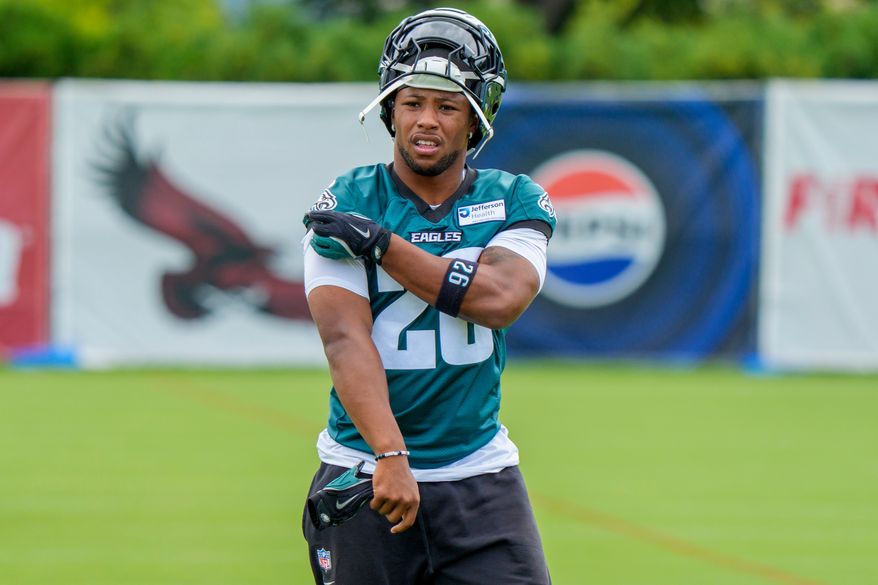 Philadelphia Eagles running back Saquon Barkley (26) looks on during practice at the team's NFL football training camp in Philadelphia, Thursday, July 30, 2026. (AP Photo/Chris Szagola)