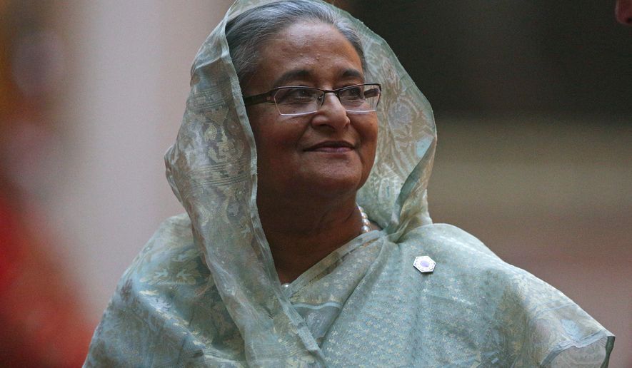 FILE - Bangladesh Prime Minister Sheikh Hasina arrives to attend The Queen's Dinner during the Commonwealth Heads of Government Meeting (CHOGM) at Buckingham Palace in London on April 19, 2018. (Daniel Leal-Olivas/Pool Photo via AP, File)