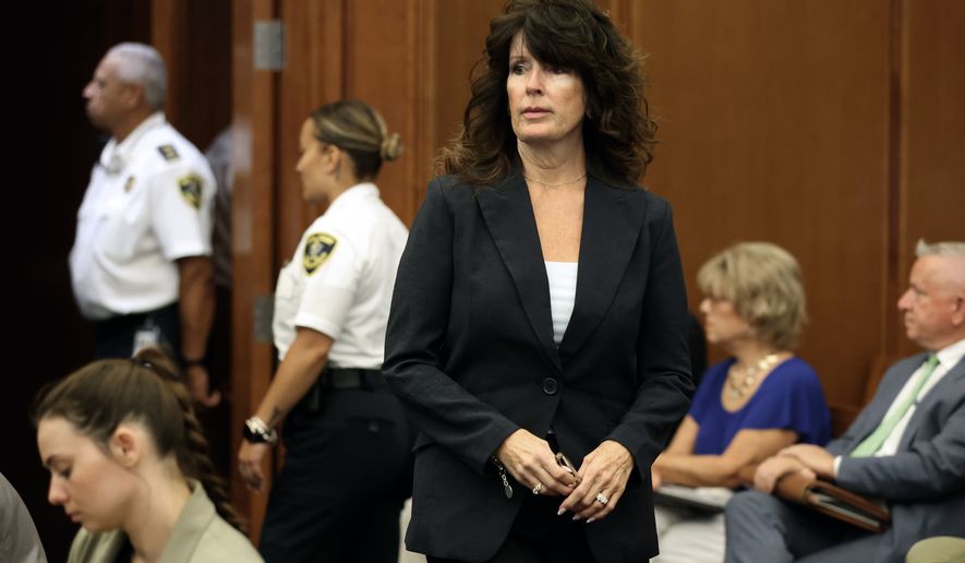 Elaine Rossi, the nanny to Clancy children, enters the courtroom to be a witness during Lindsay Clancy's murder trial at Plymouth Superior Court in Plymouth, Mass., Wednesday, Aug. 5, 2026. (David L Ryan/The Boston Globe via AP, Pool)