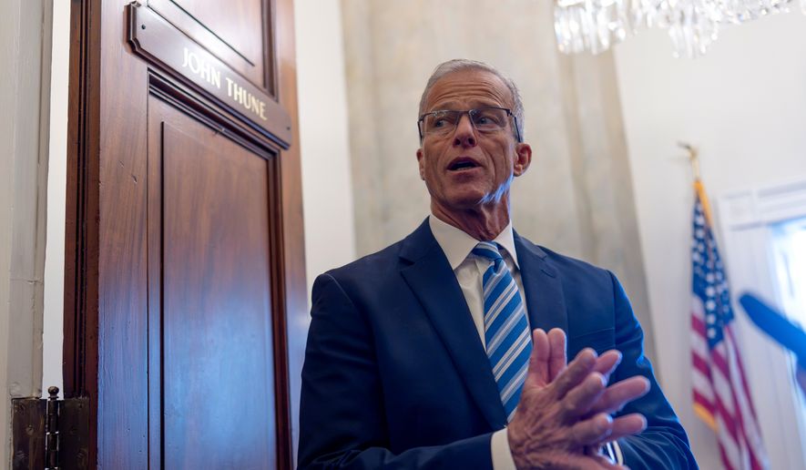 Senate Majority Leader John Thune, R-S.D., tells reporters at the Capitol in Washington on Thursday, July 23, 2026, that the Senate has a busy two weeks of work ahead before the August recess. (AP Photo/J. Scott Applewhite) ** FILE **