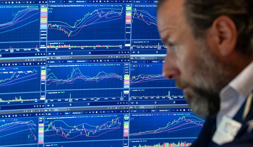 Specialist Michael Pistillo works on the floor of the New York Stock Exchange, Wednesday, Aug.. 5, 2026, in New York. (AP Photo/Yuki Iwamura)