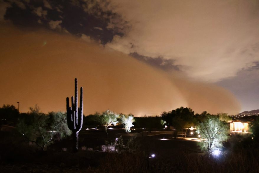 This photo provided by Sean Voysey Olson shows a large haboob dust storm Monday, Aug. 3, 2026, in Scottsdale, Ariz. (Sean Voysey Olson via AP)