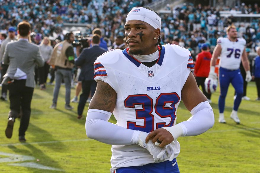 FILE - Buffalo Bills cornerback Cam Lewis (39) leaves the field after defeating the Jacksonville Jaguars in an NFL wild card playoff football game, Jan. 11, 2026, in Jacksonville, Fla. (AP Photo/Gary McCullough, File)