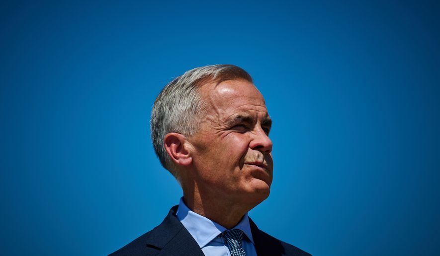 Prime Minister Mark Carney attends a housing announcement in Toronto, on Wednesday, Aug. 5, 2026. (Sammy Kogan/The Canadian Press via AP)