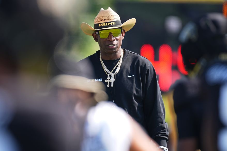 Colorado head coach Deion Sanders looks on during a practice at an NCAA college football training camp in Fountain, Colo., Thursday, Aug. 6, 2026. (AP Photo/David Zalubowski)