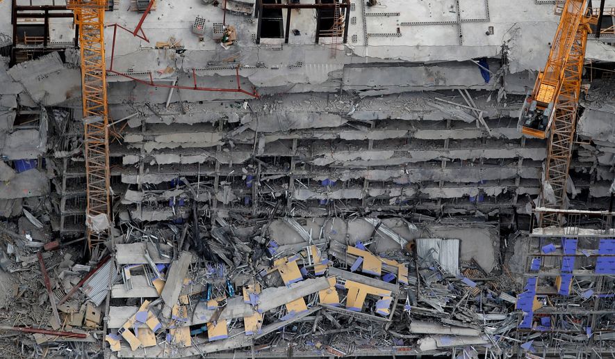 FILE - This aerial photo shows the Hard Rock Hotel, which was under construction, after a fatal partial collapse in New Orleans on Oct. 12, 2019. (AP Photo/Gerald Herbert, File)