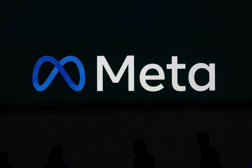 A Meta logo is shown on a video screen at LlamaCon 2025, an AI developer conference, in Menlo Park, Calif., April 29, 2025. (AP Photo/Jeff Chiu, File)