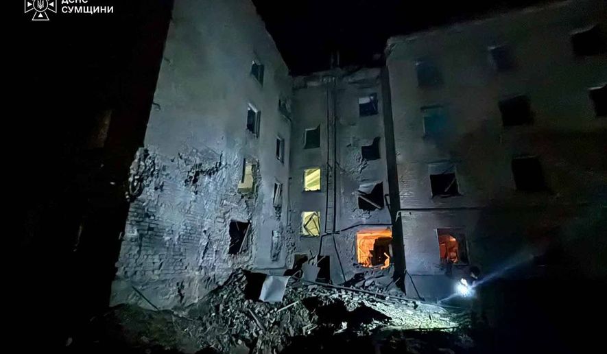 In this photo provided by the Ukrainian Emergency Service, a residential building is damaged following a Russian air attack in Sumy, Ukraine, Thursday, Aug. 6, 2026. (Ukrainian Emergency Service via AP)
