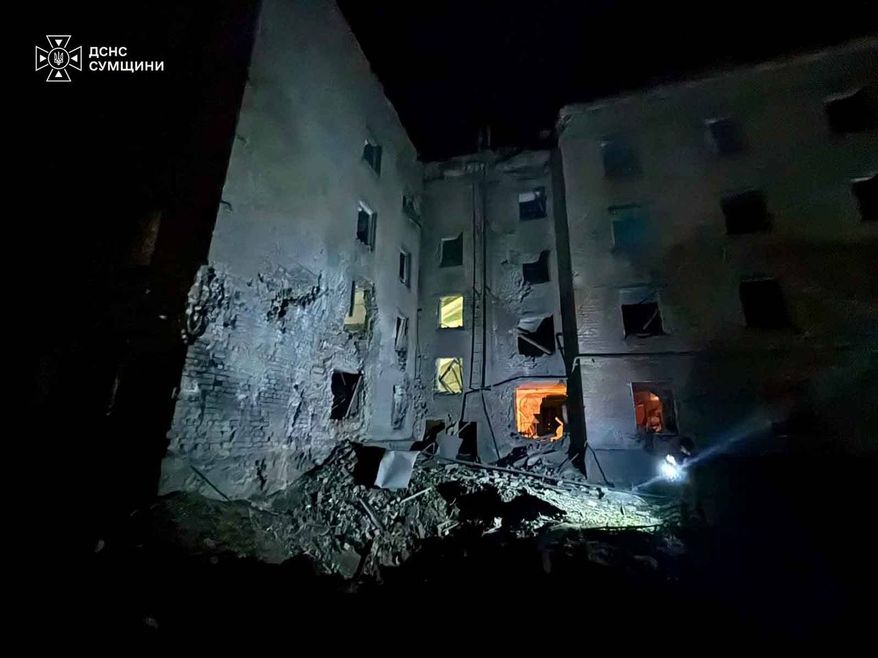In this photo provided by the Ukrainian Emergency Service, a residential building is damaged following a Russian air attack in Sumy, Ukraine, Thursday, Aug. 6, 2026. (Ukrainian Emergency Service via AP)