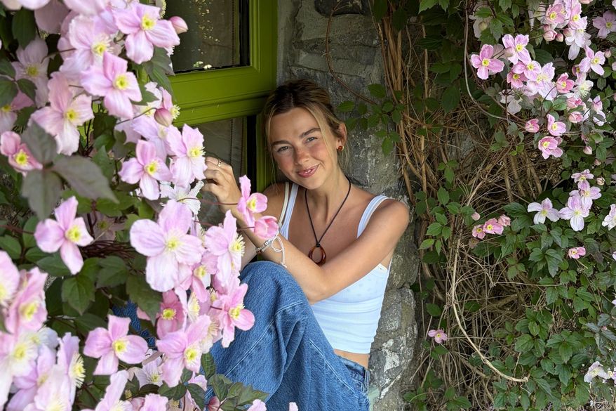 This undated photo provided by Elizabeth Morrow on Thursday, Aug. 6, 2026, shows Sydney Towle smiling for a photo. (Elizabeth Morrow via AP)