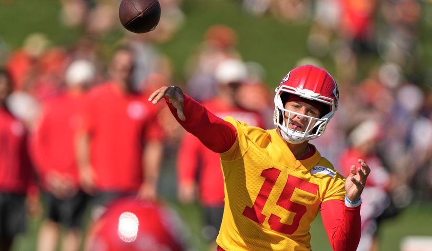 Kansas City Chiefs quarterback Patrick Mahomes throws during NFL football training camp Saturday, Aug. 1, 2026, in St. Joseph, Mo. (AP Photo/Charlie Riedel)