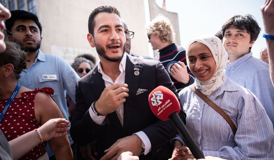 Abdul El-Sayed departs following a news conference at the Spirit of Detroit shortly after winning the Democratic nomination for U.S. Senate in Michigan, Wednesday, Aug. 5, 2026, in Detroit. (AP Photo/Julia Demaree Nikhinson)